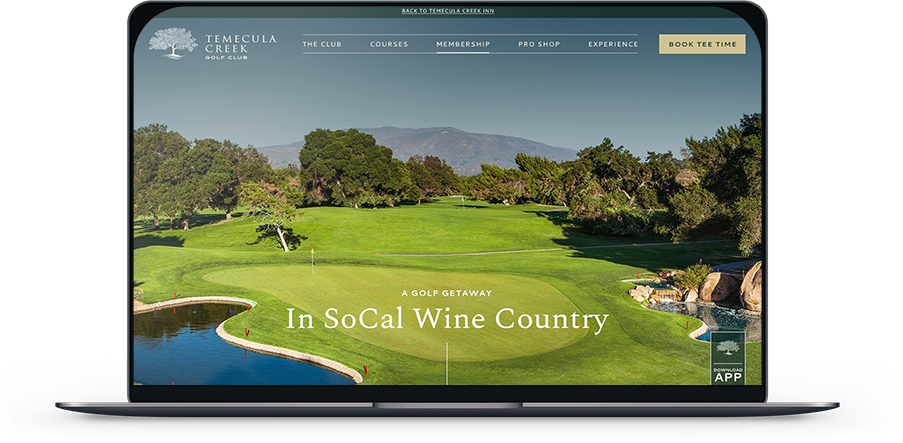 Laptop showing Temecula Creek Inn website